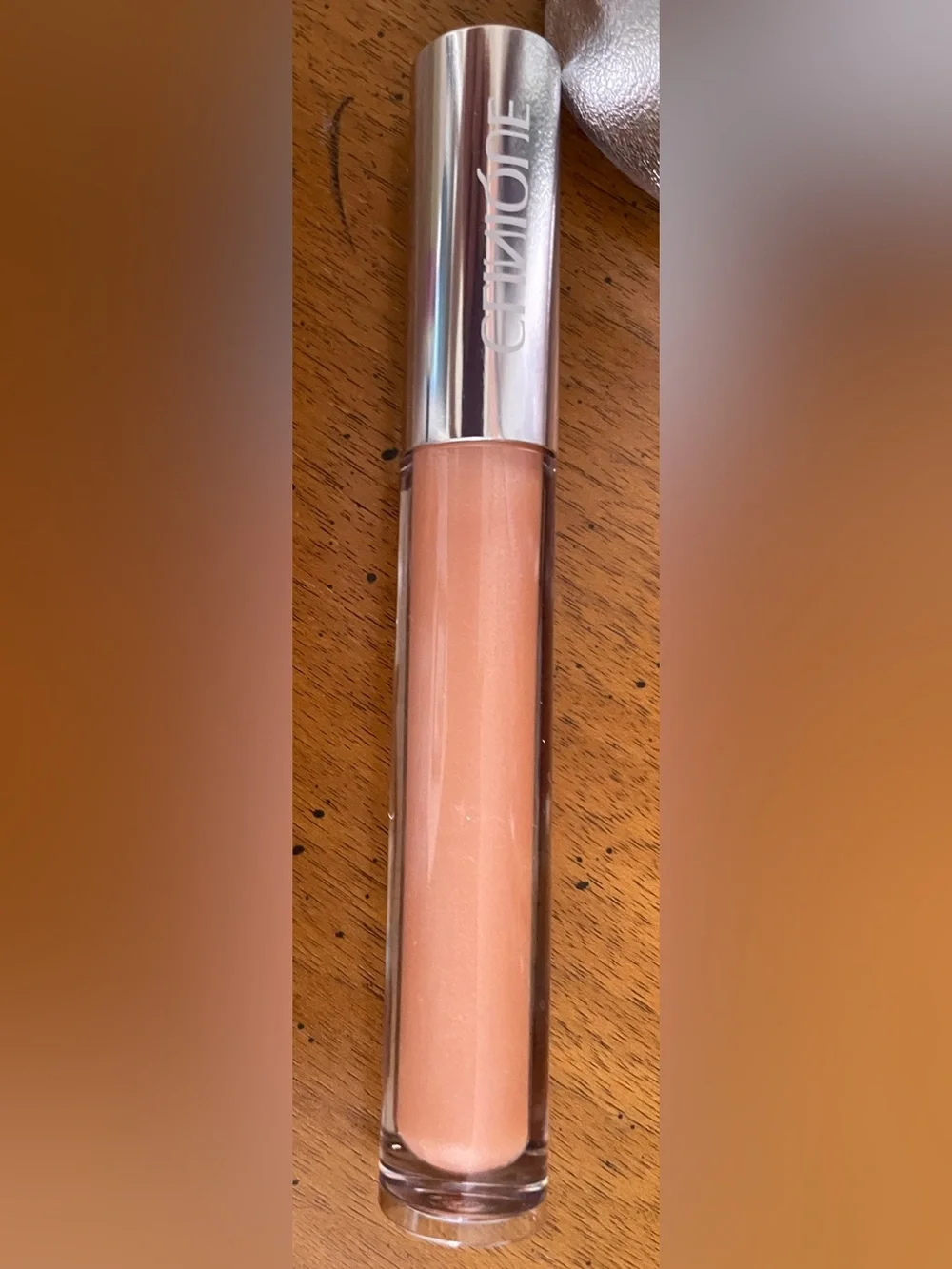 Clinique 4-Piece Lot: Dramatically Different Lotion, 7 Day Scrub, Lip Gloss, Bag